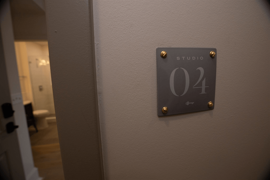 the door to a room with a sign that reads studio 24